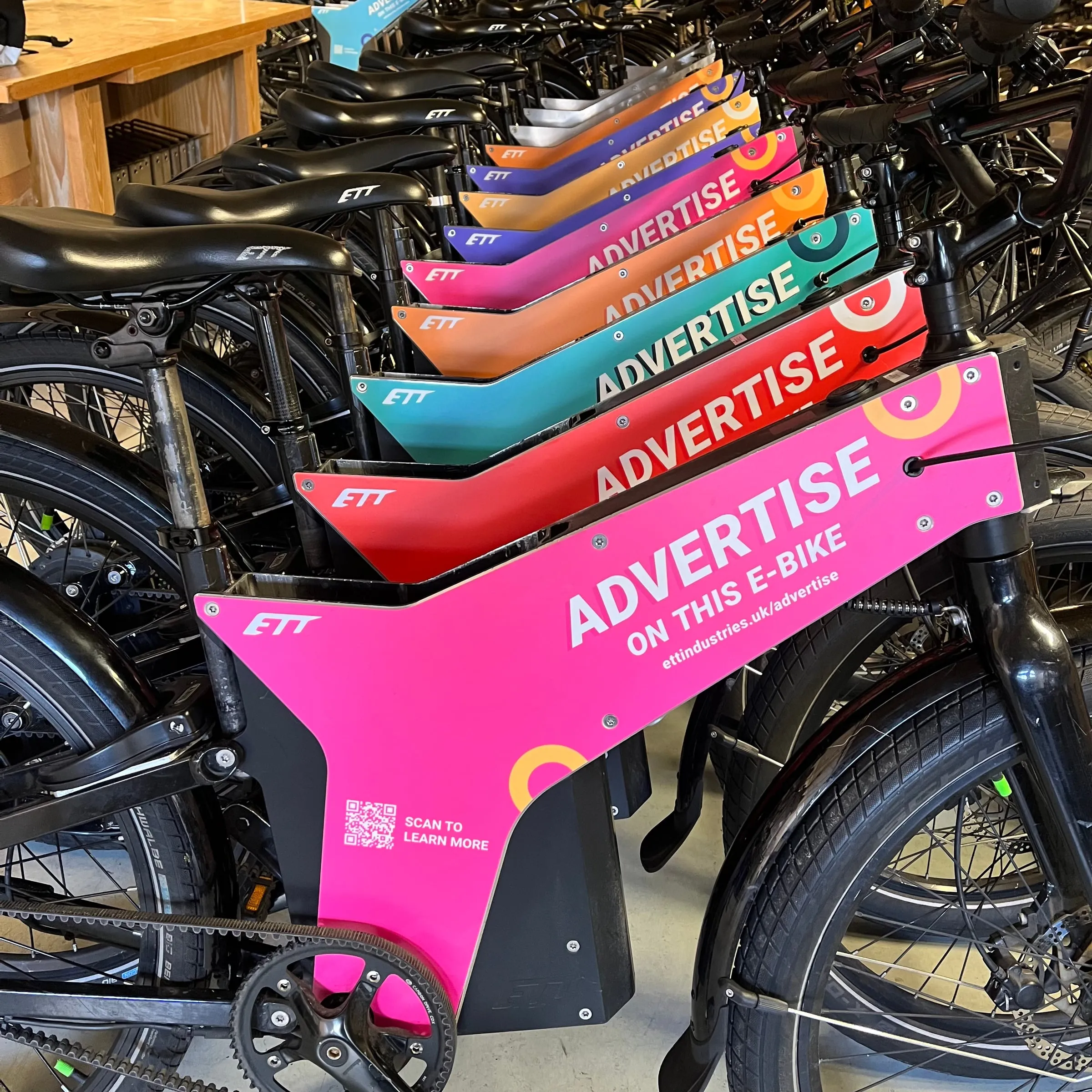 Stack of colourful AdRider advertising side panels